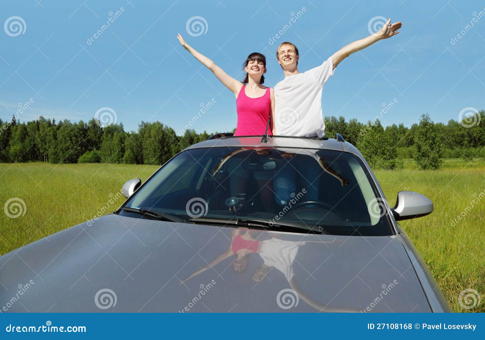 Young Attractive Couple Posing In A Convertible Car, By The Sea Stock  Photo, Picture and Royalty Free Image. Image 103721226.