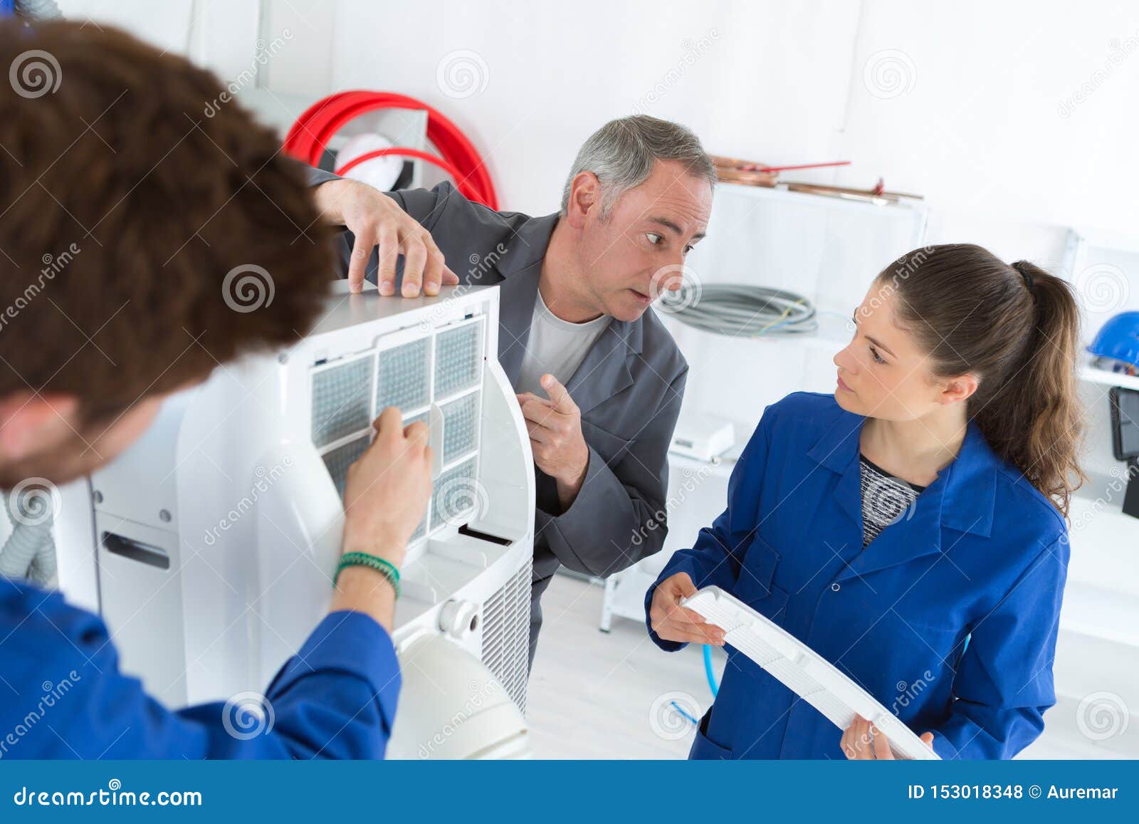 Hvac Repair Technicians Working on Commercial Heating Air Conditioning