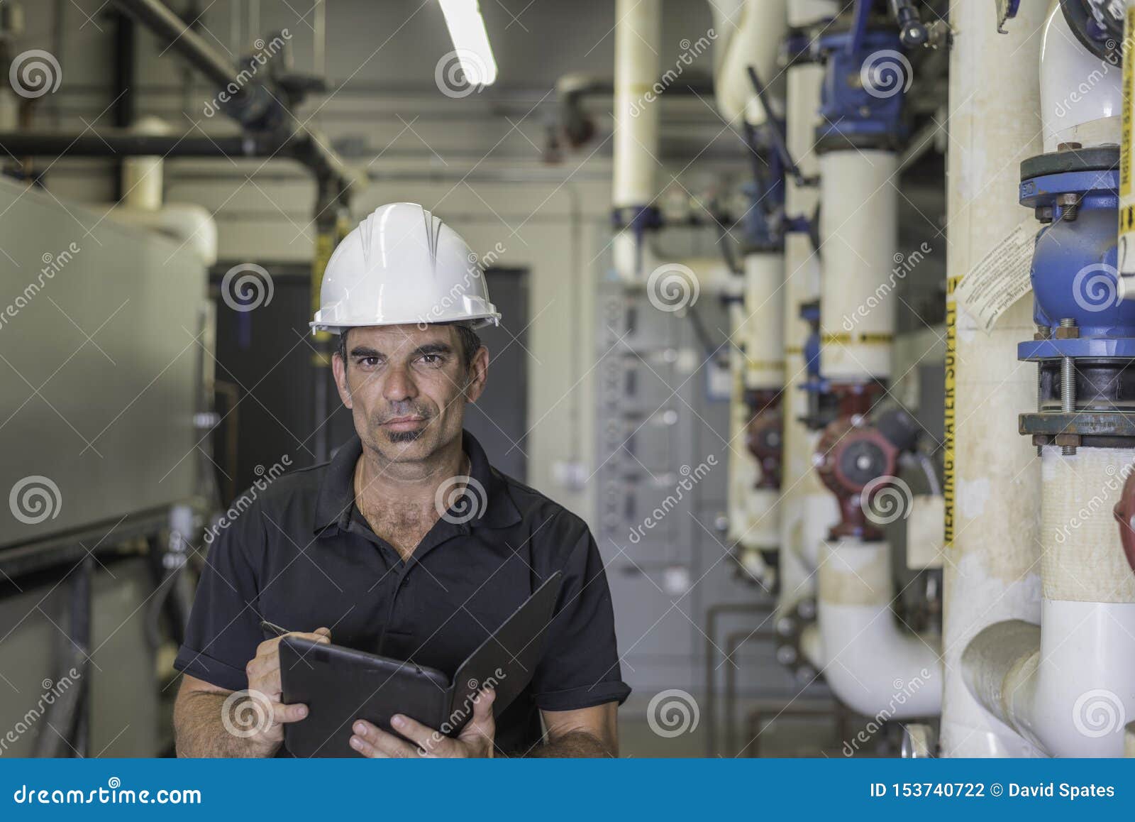 HVAC tech with Tablet stock photo. Image of mechanical 153740722