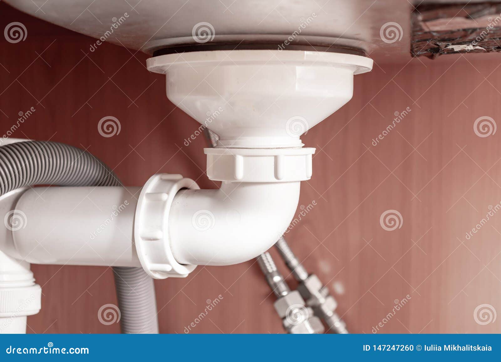 Hydraulic Siphon Pipes And Water Drain Under The Kitchen