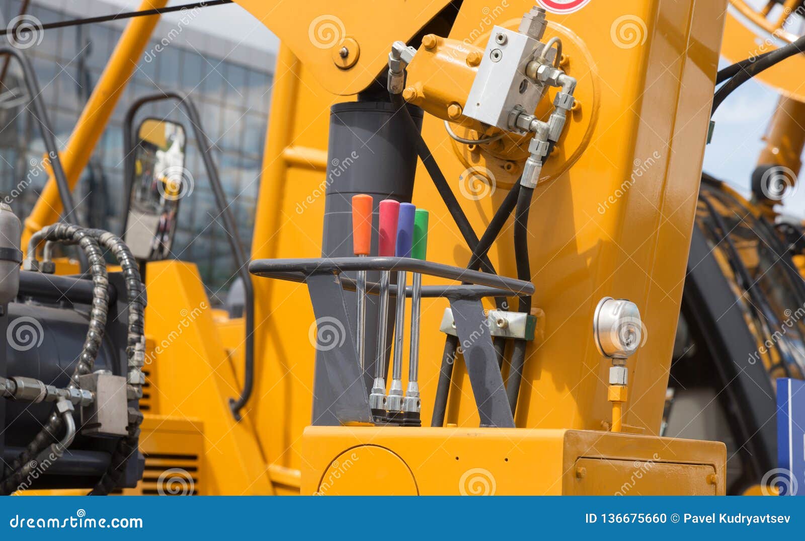 Hydraulic Tubes, Fittings and Levers on Control Panel Stock Photo