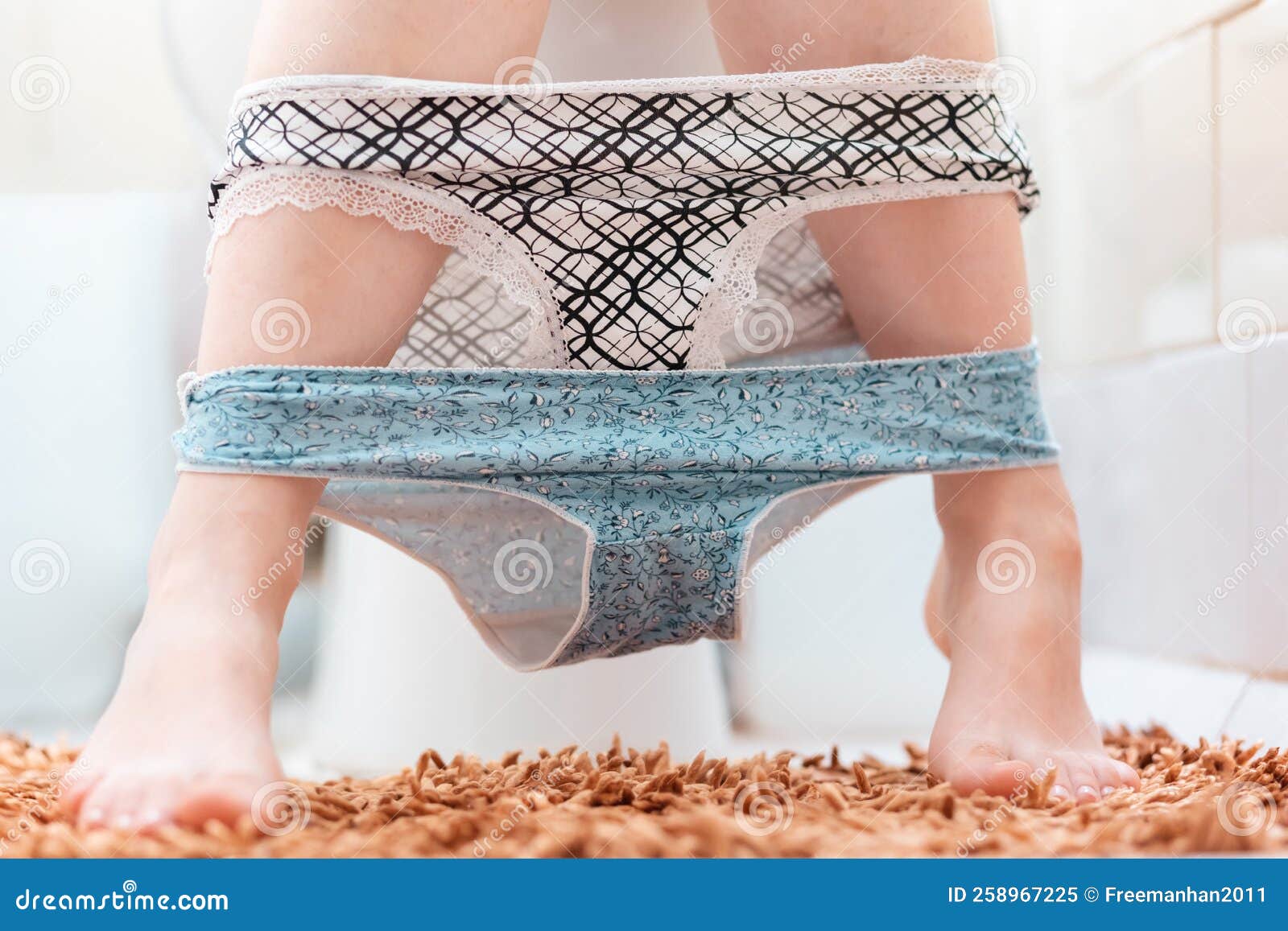 Hygiene and Cystitis. a Woman is Sitting on the Toilet with Two Panties  Removed. Close-up of the Legs Stock Image - Image of female, incontinence:  258967225
