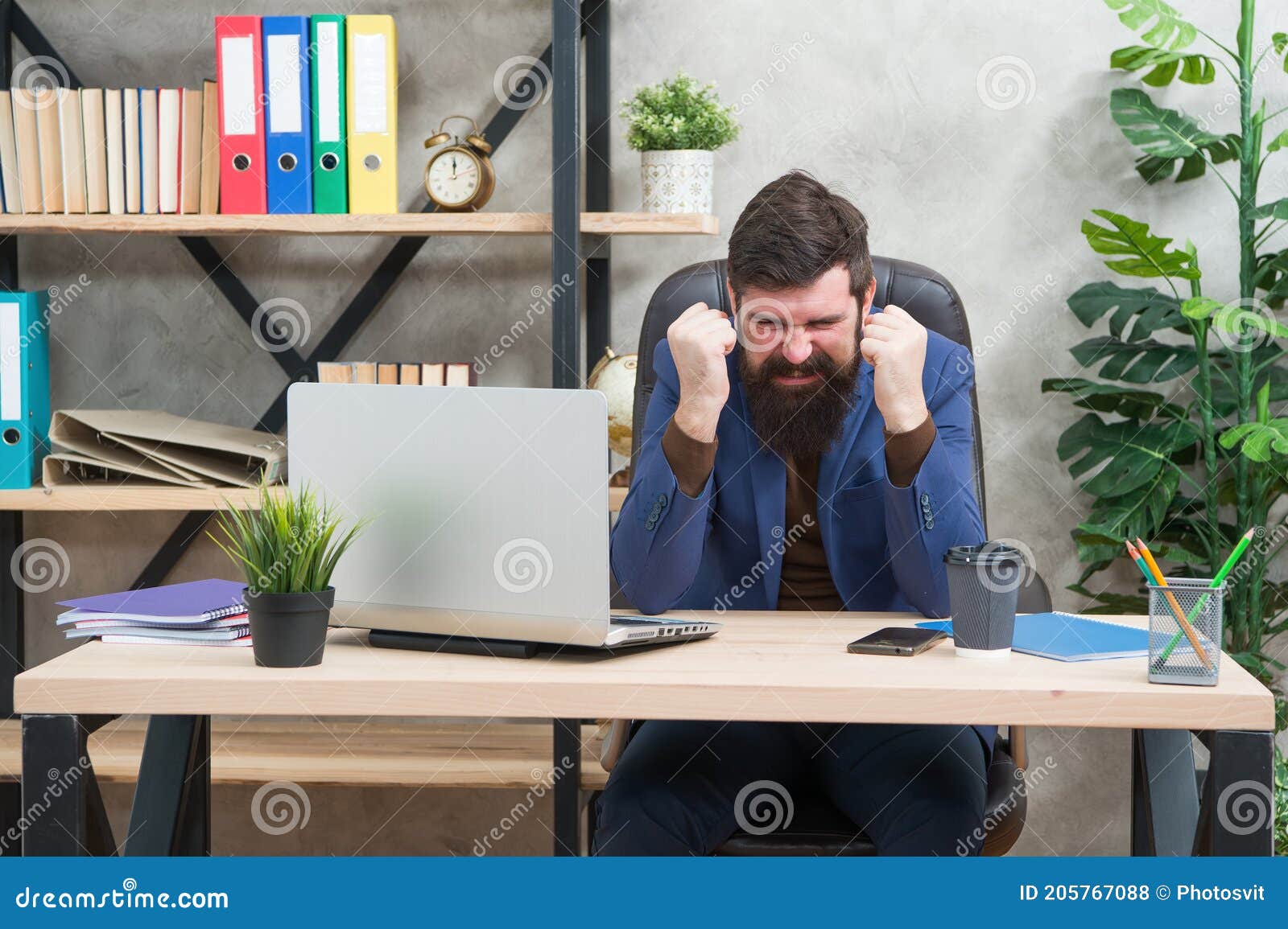 hysterical nervous engineer in business suit scream of negative emotions at office desk, hysterics