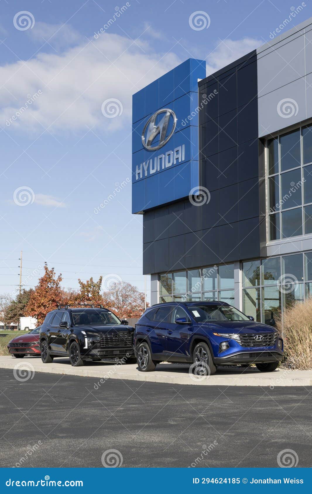 Hyundai Tucson and Palisade Display at a Dealership. Hyundai Offers a ...