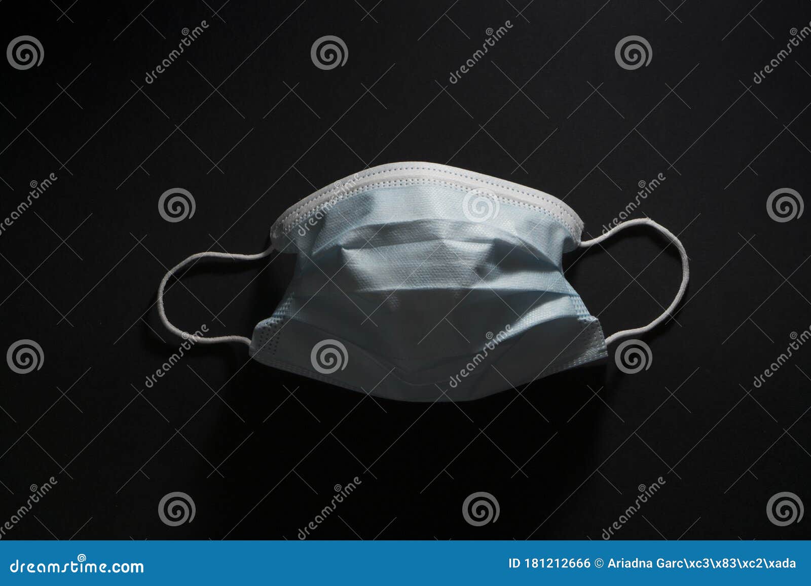 a face masks for virus protection on black background