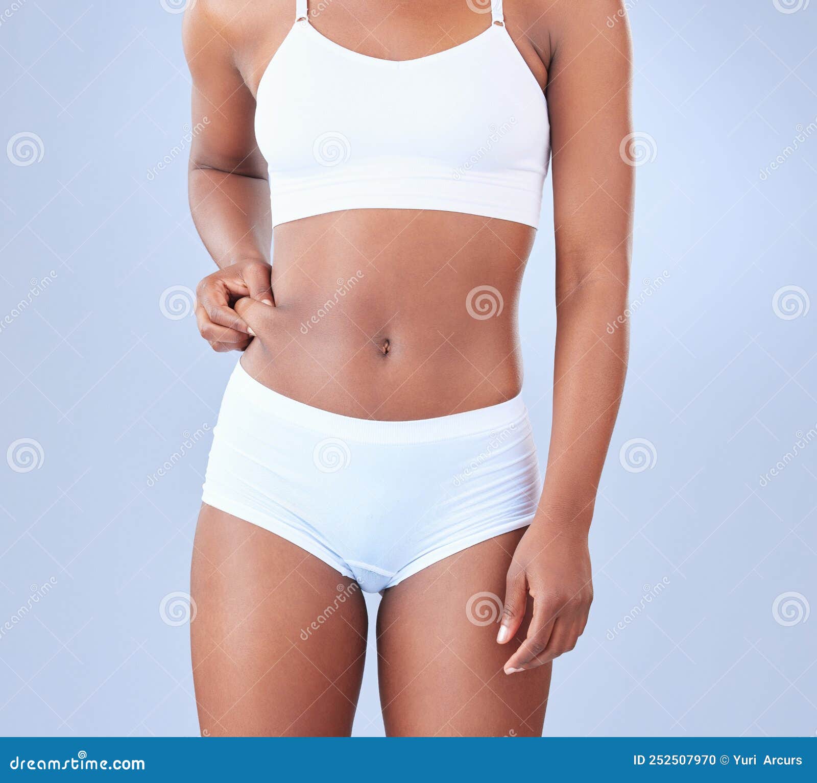 Women Lifting And Pulling Her Elastic Panties On A White Background Stock  Photo, Picture and Royalty Free Image. Image 69109218.