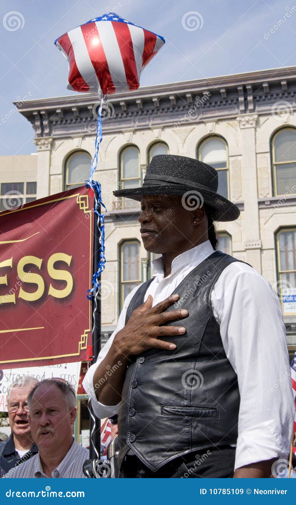 pledge-of-allegiance-with-a-large-american-flag-at-a-university-of