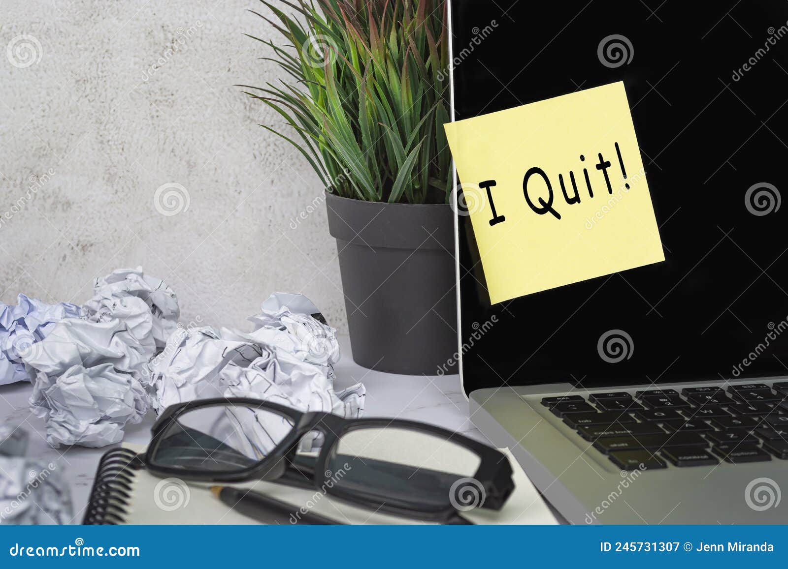 I Quit Text on Sticky Note on Laptop . Concept of Decision Making To