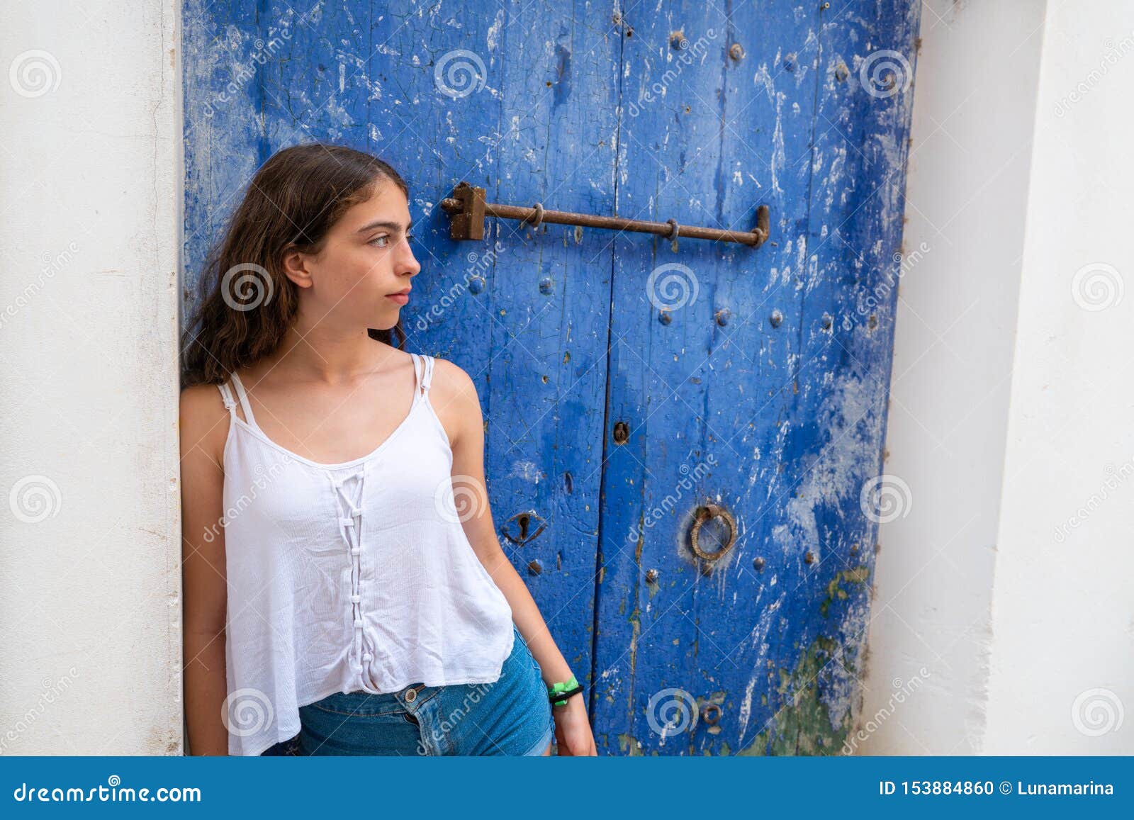 ibiza eivissa young girl on blue door