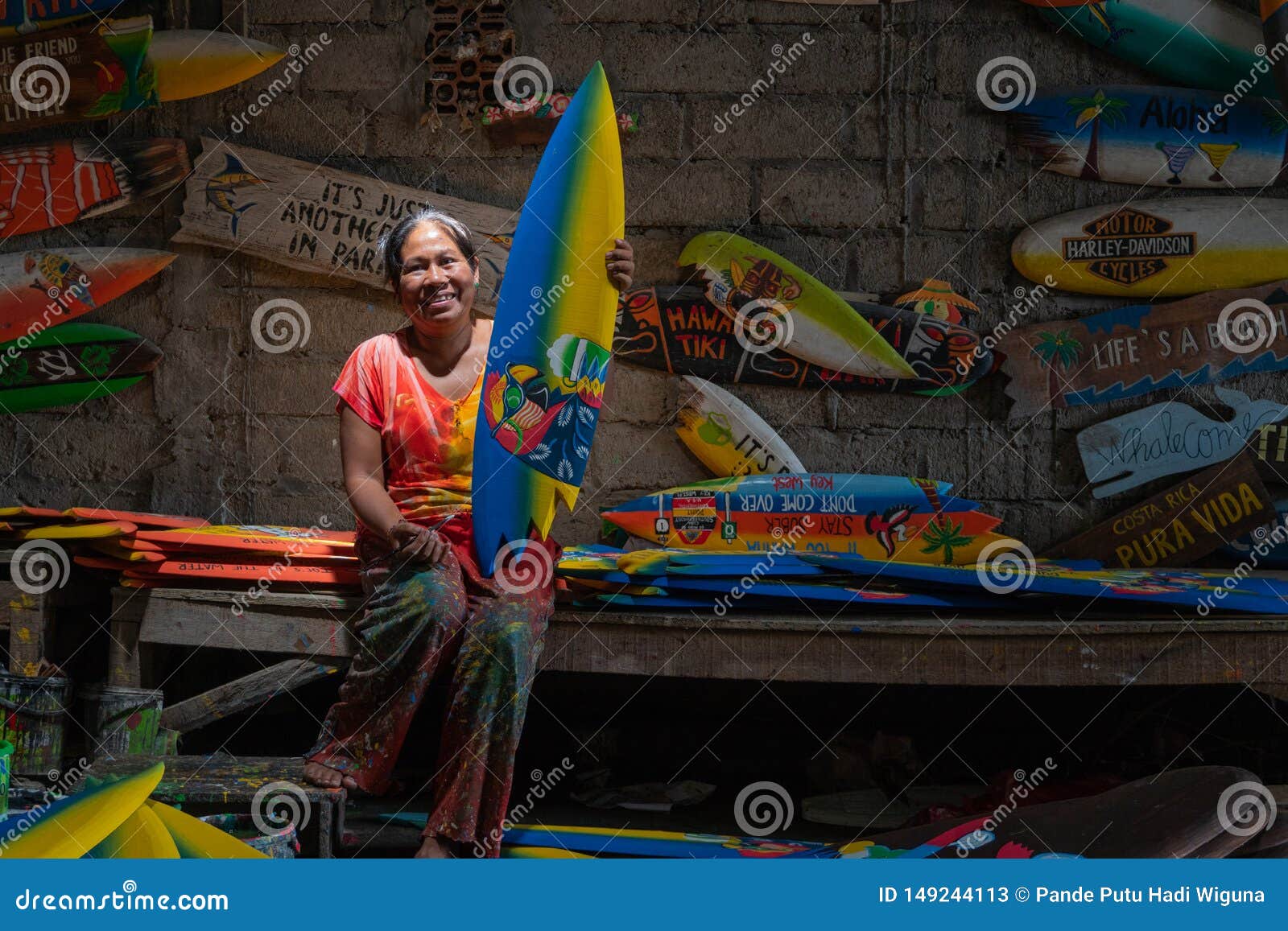 Ibu Demon Is A Craftsman From Ubud. Every Day She Made Mini Surf Boat