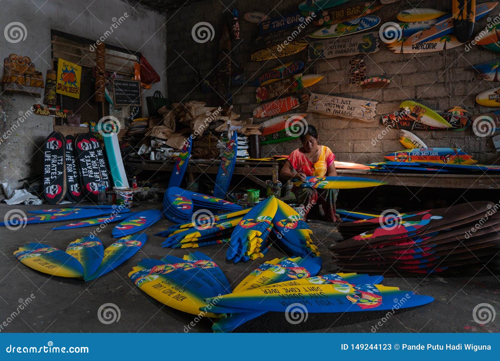 Ibu Demon Is A Craftsman From Ubud. Every Day She Made Mini Surf Boat