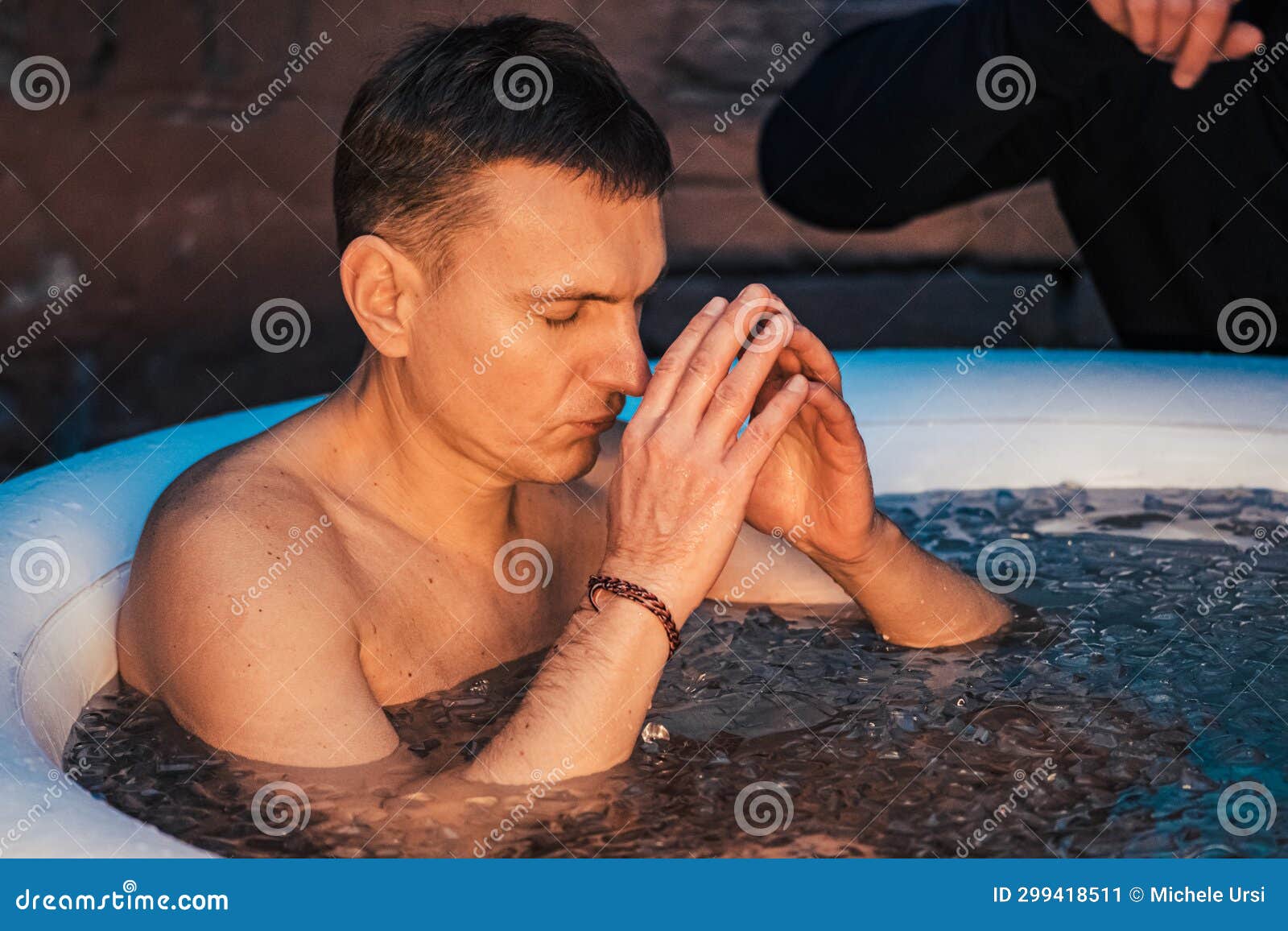 Ice Bathing in the Cold Water in an Inflatable Pool Editorial Photo