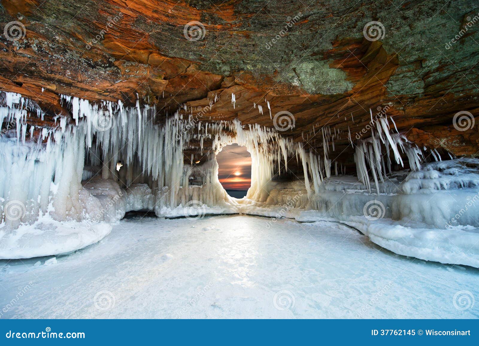 ice caves at apostle islands, winter sunset