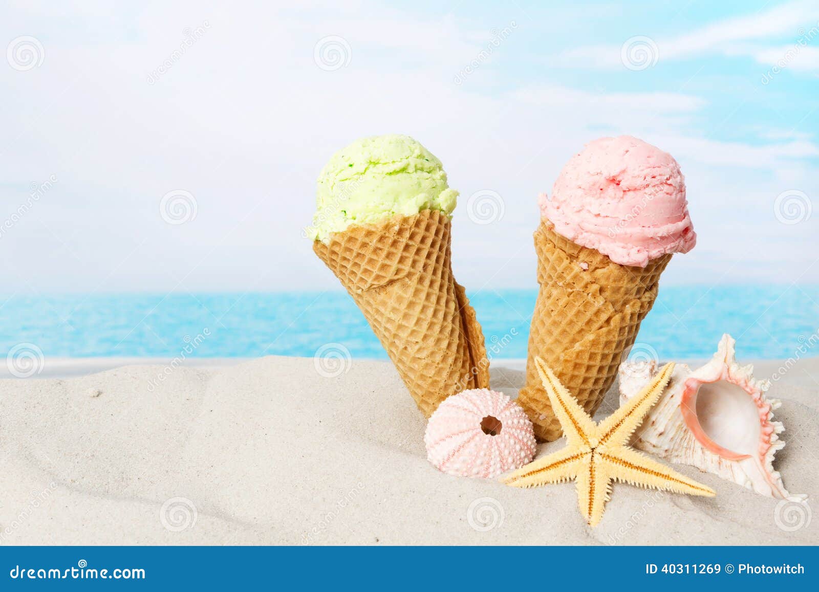 cone cream ice gourmet on cream ice seashells and beach. the the in cones sand Two cone cream ice gourmet on cream ice seashells and beach. the the in cones sand Two