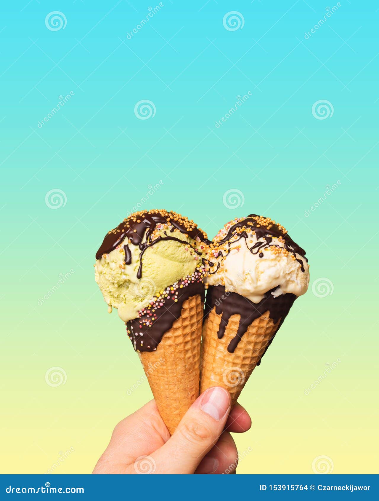 https://thumbs.dreamstime.com/z/ice-cream-cones-held-palm-your-hand-wafers-dessert-chocolate-topping-colored-sprinkles-rainbow-153915764.jpg