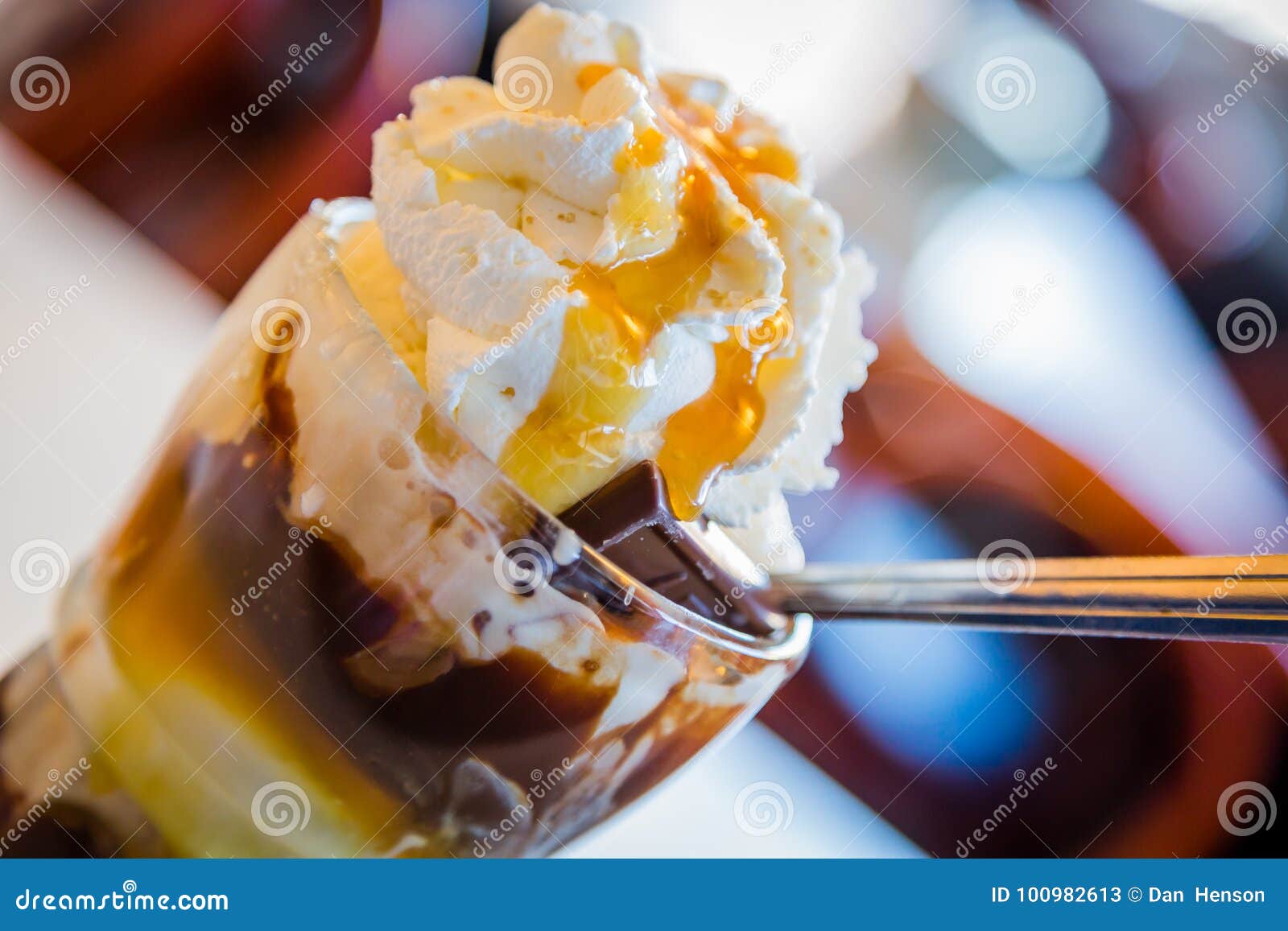 ice cream with whipped cream and toffee sauce