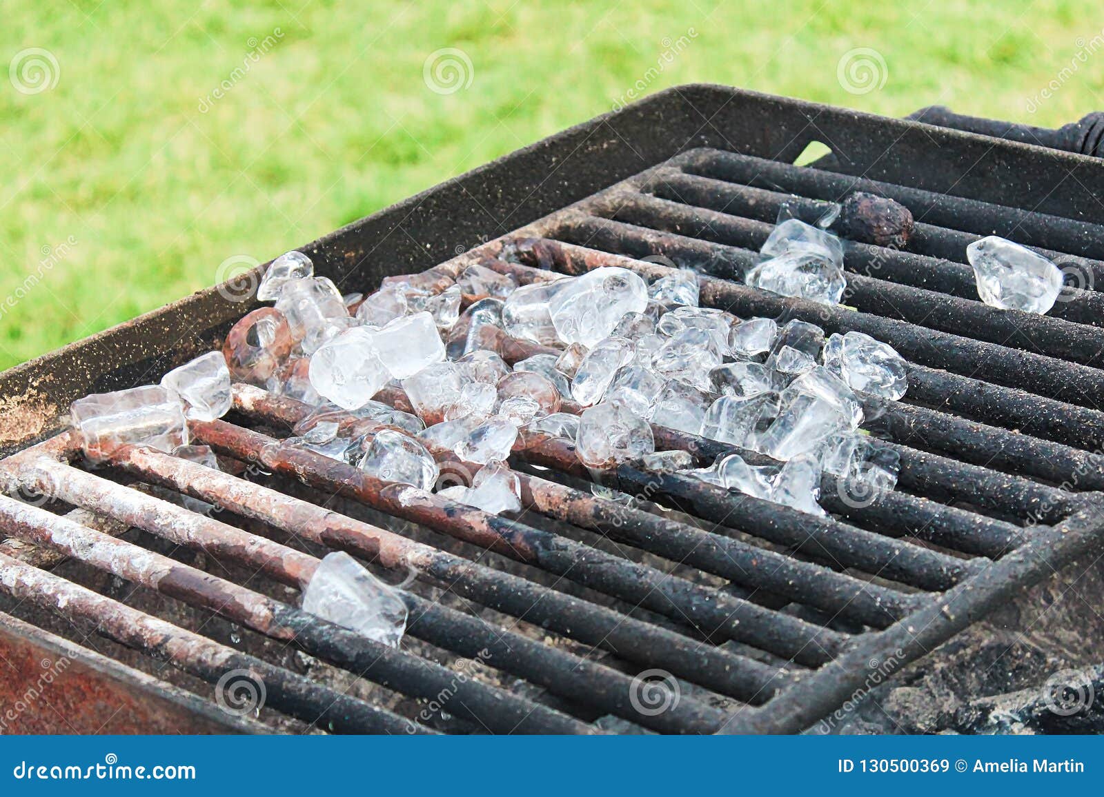 Ice Cubes Melting on a Barbeque Grill Stock Image Image of empty