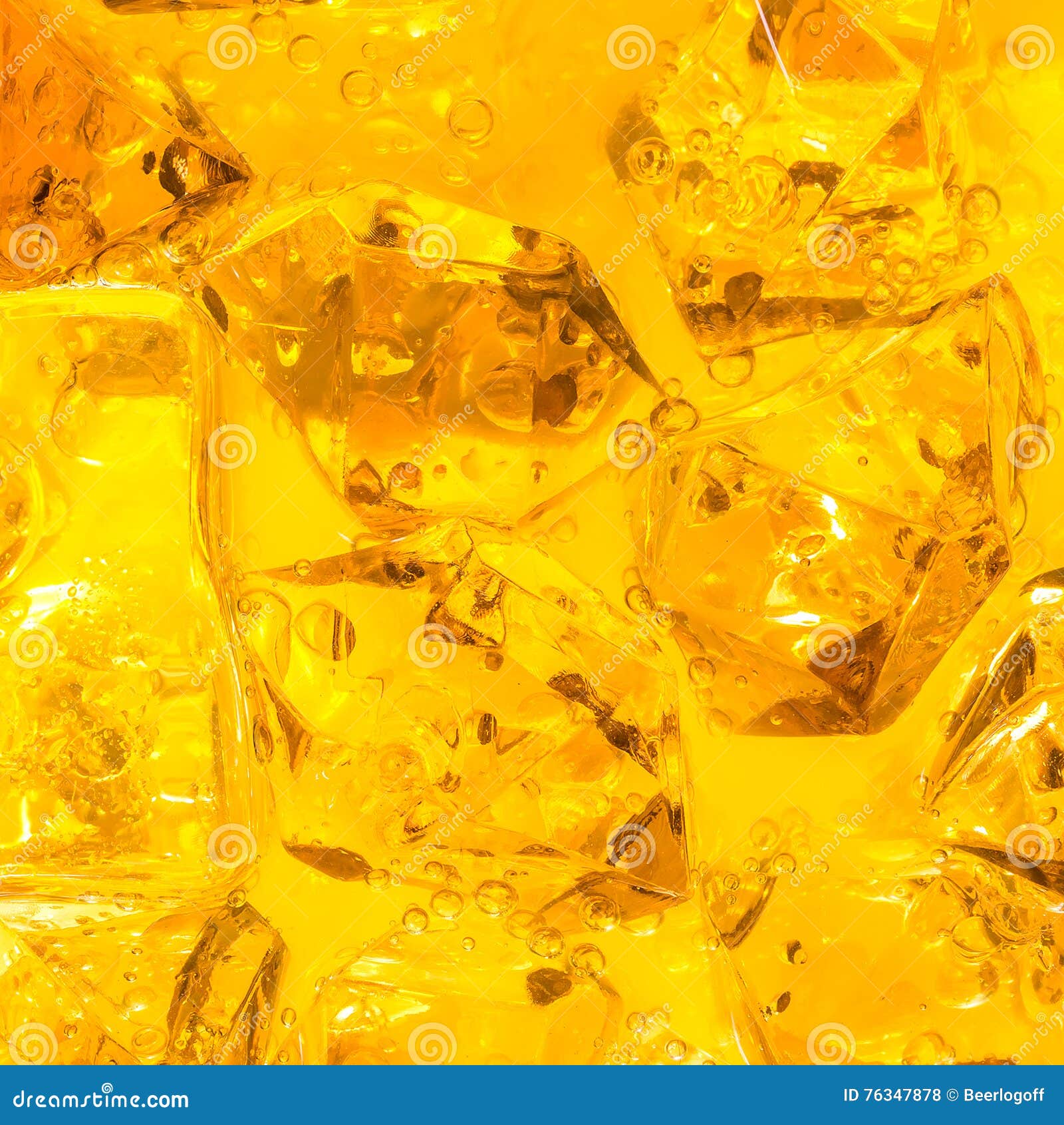 Ice cubes in orange juice stock photo. Image of clear 76347878