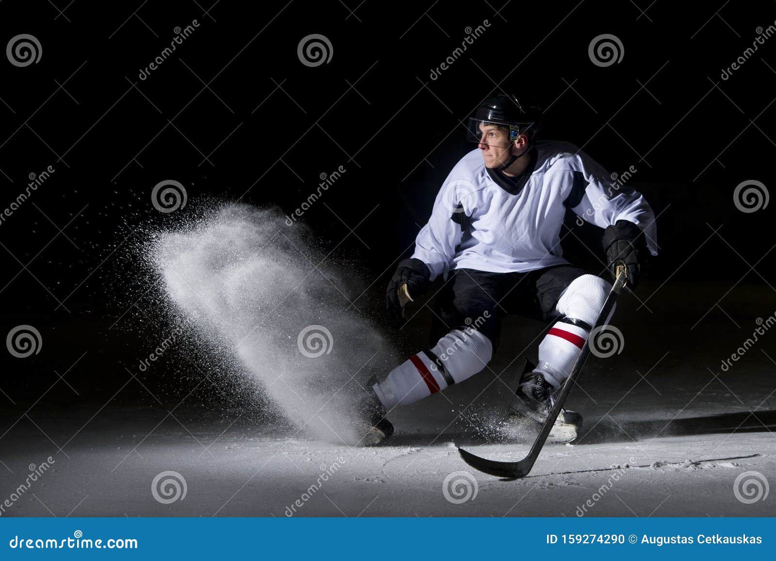 Ice Hockey Player in Action Kicking with Stick Stock Photo Image of