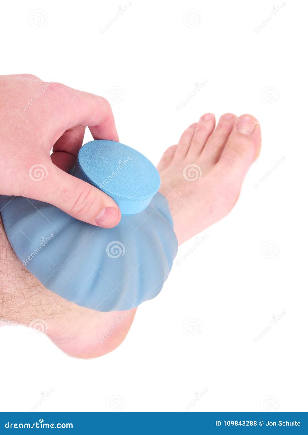 Ice pack on ankle isolated stock photo. Image of physical 109843288