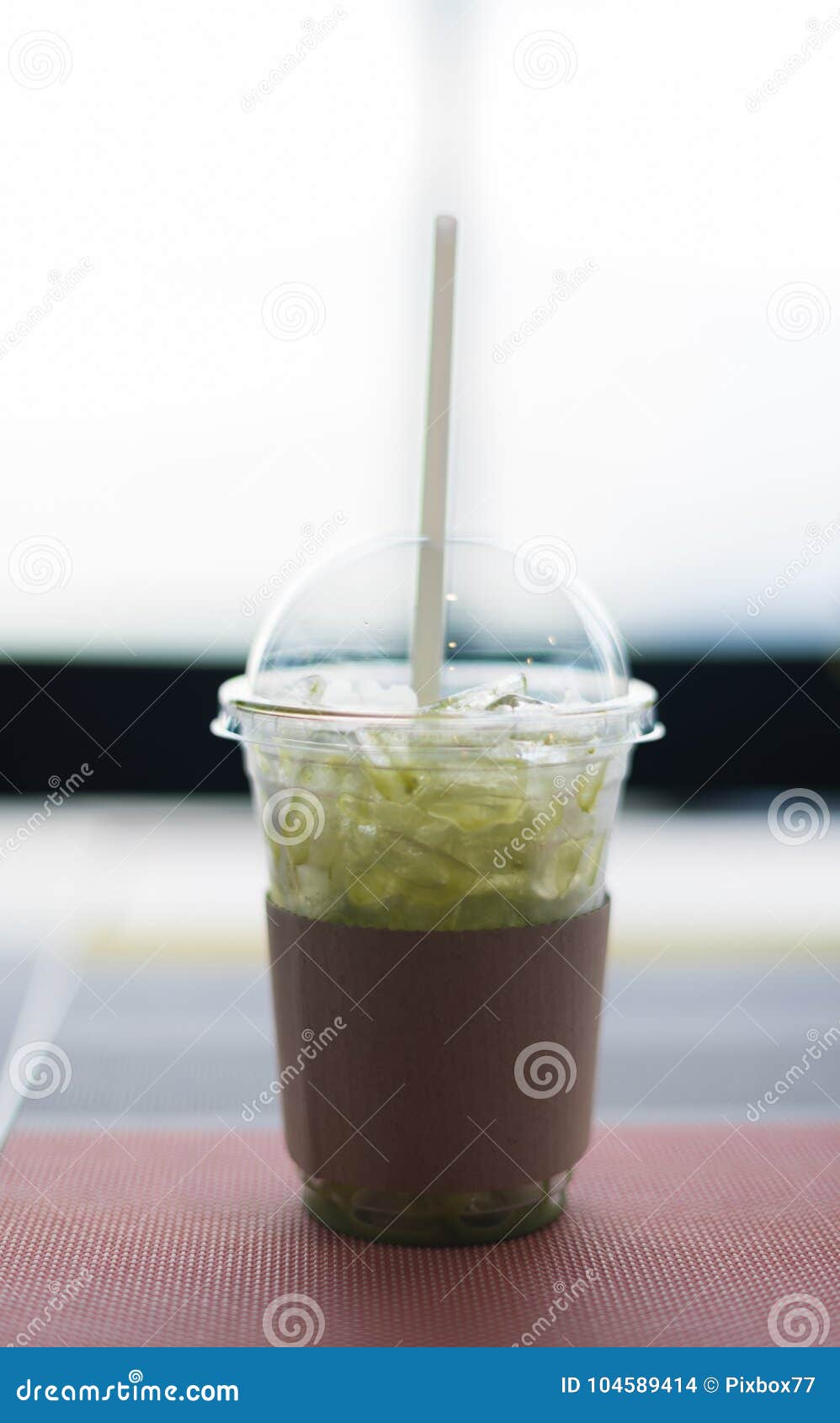 Fresh Ice Tea In Plastic Glass With Straw Stock Photo, Picture and Royalty  Free Image. Image 29464317.