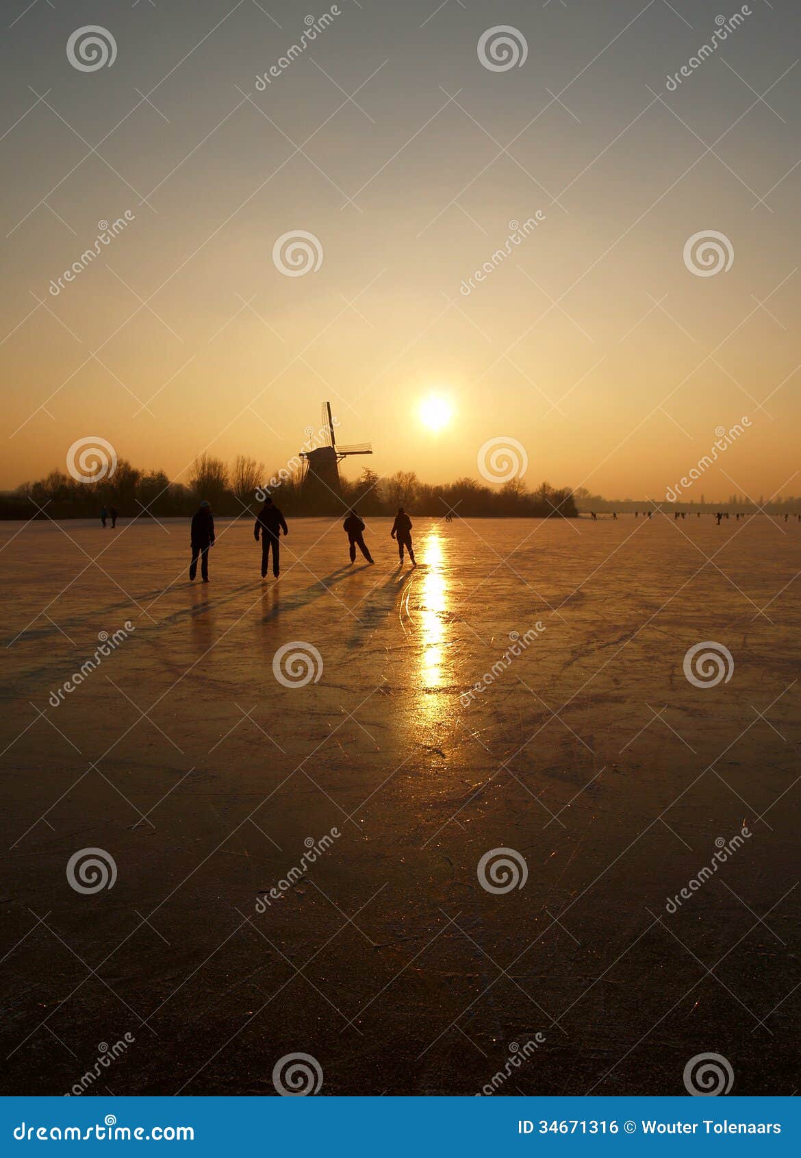 ice skaters on a frozen lake in rotterdam the netherlands