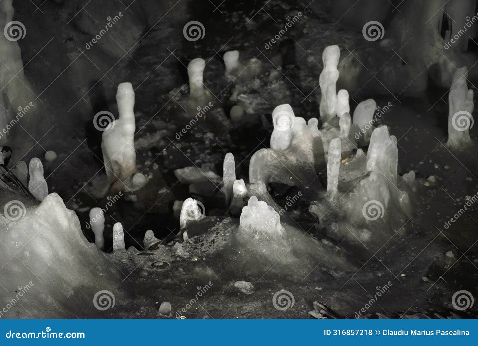 ice stalagmites in scarisoara ice cave, `the church` area, apuseni natural park, romania