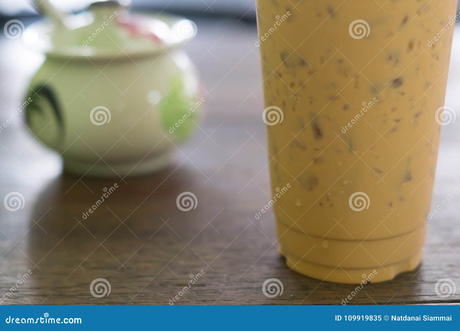 Ice tea in plastic glass stock image. Image of drink 109919835