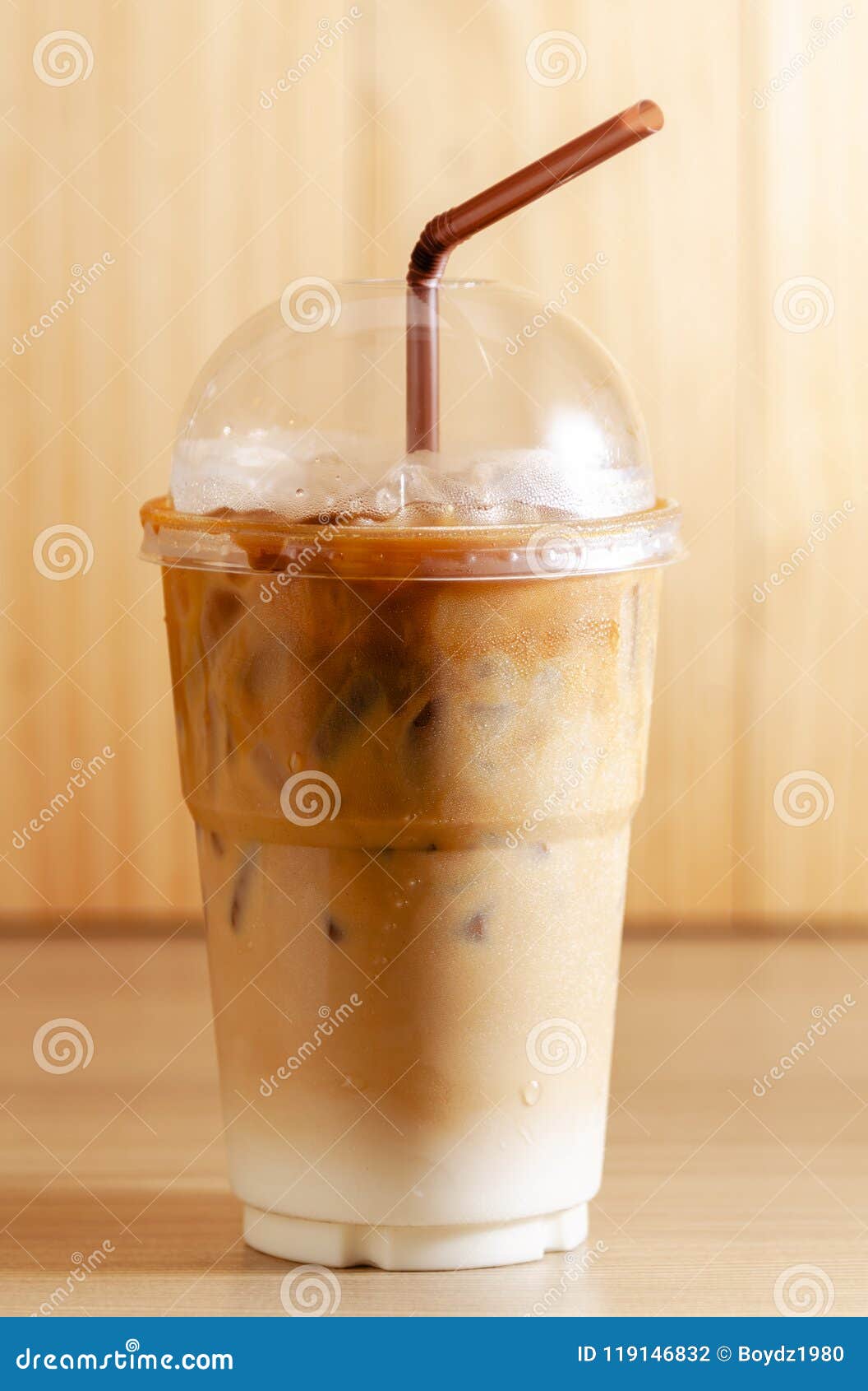 https://thumbs.dreamstime.com/z/iced-coffee-cup-straw-latte-take-away-plastic-glass-wooden-background-119146832.jpg