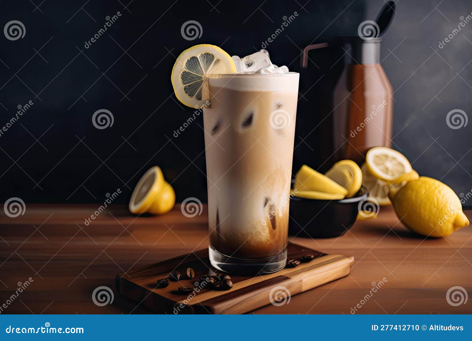 iced coffee latte with foamy head and wedge of lemon on the side