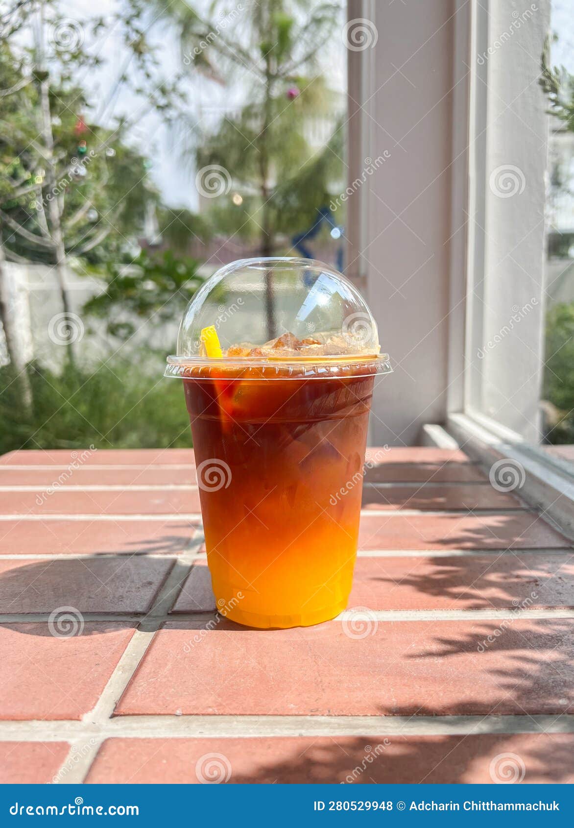 Iced Coffee Mixed with Orange Juice in Cafe Stock Photo Image of