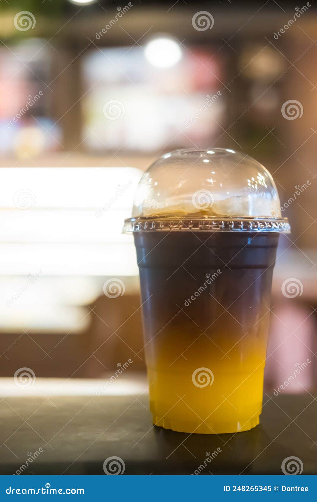 Iced Coffee Mixed with Orange Juice, Two Tones Layer Stock Image Image of coffee, closeup