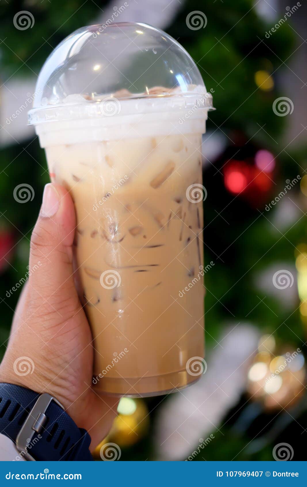Iced coffee ready to drink stock image. Image of holding 107969407