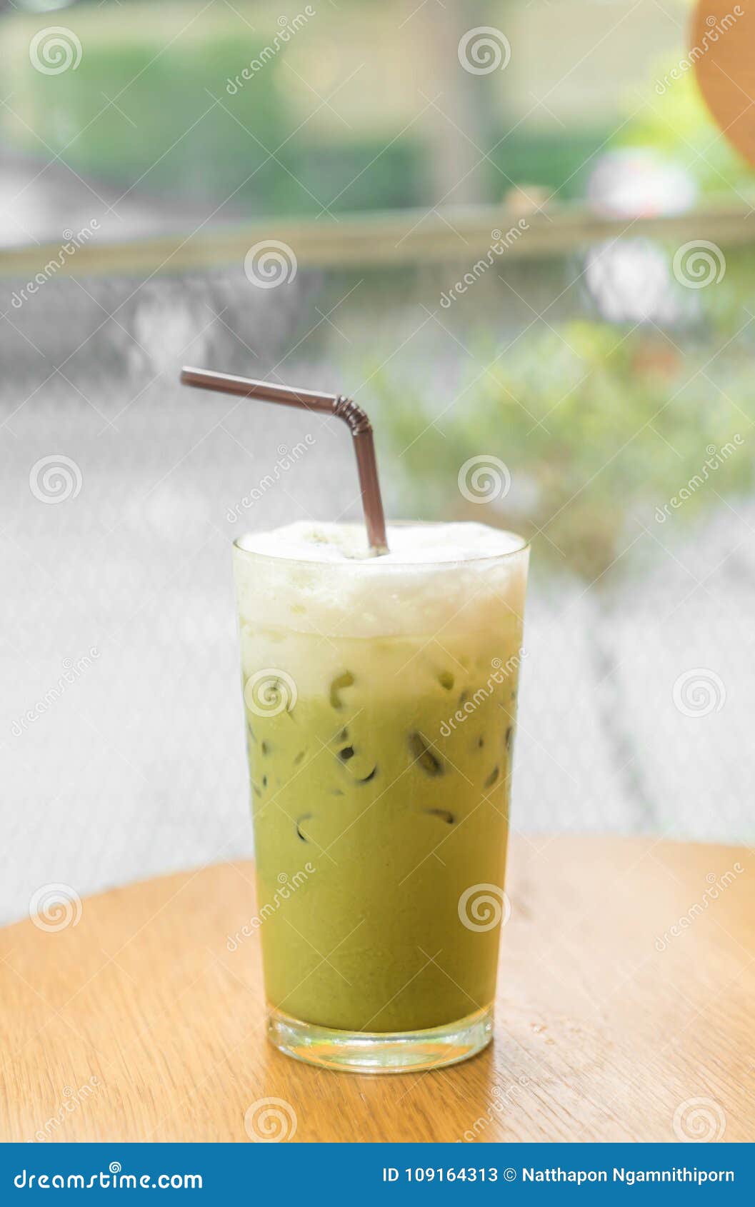 Iced green tea with milk stock image. Image of glass 109164313