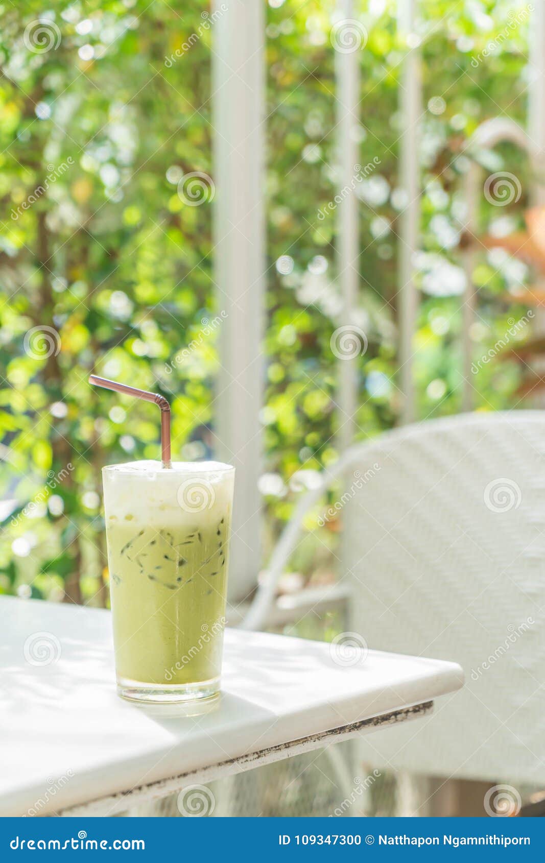 Iced green tea with milk stock photo. Image of cream 109347300