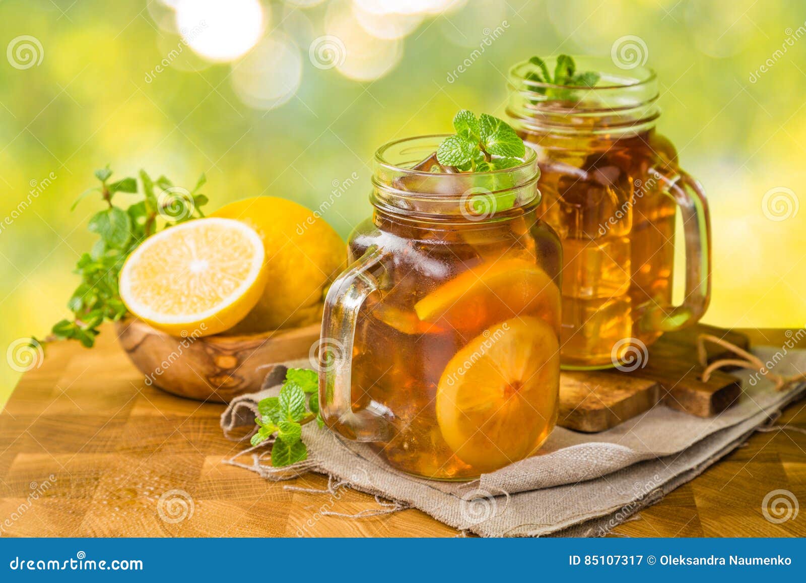 Iced tea in glass jars stock image. Image of yellow, white 85107317