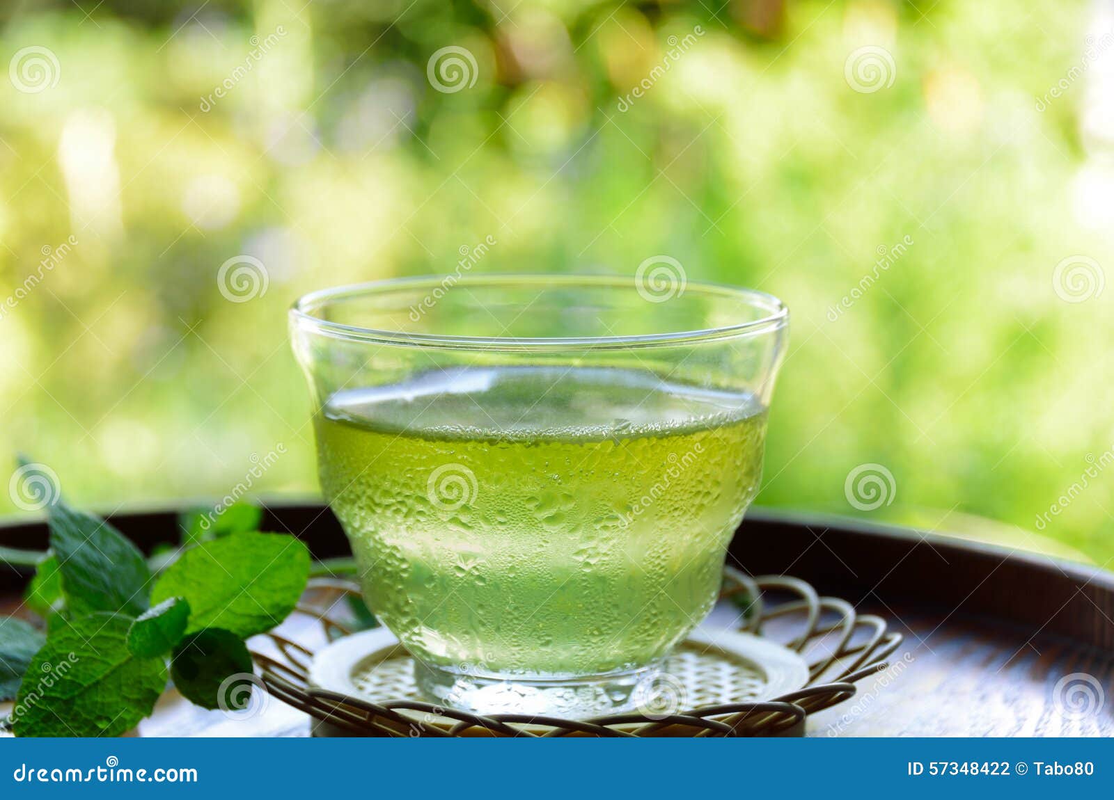 Iced tea with mint leaves stock photo. Image of break 57348422