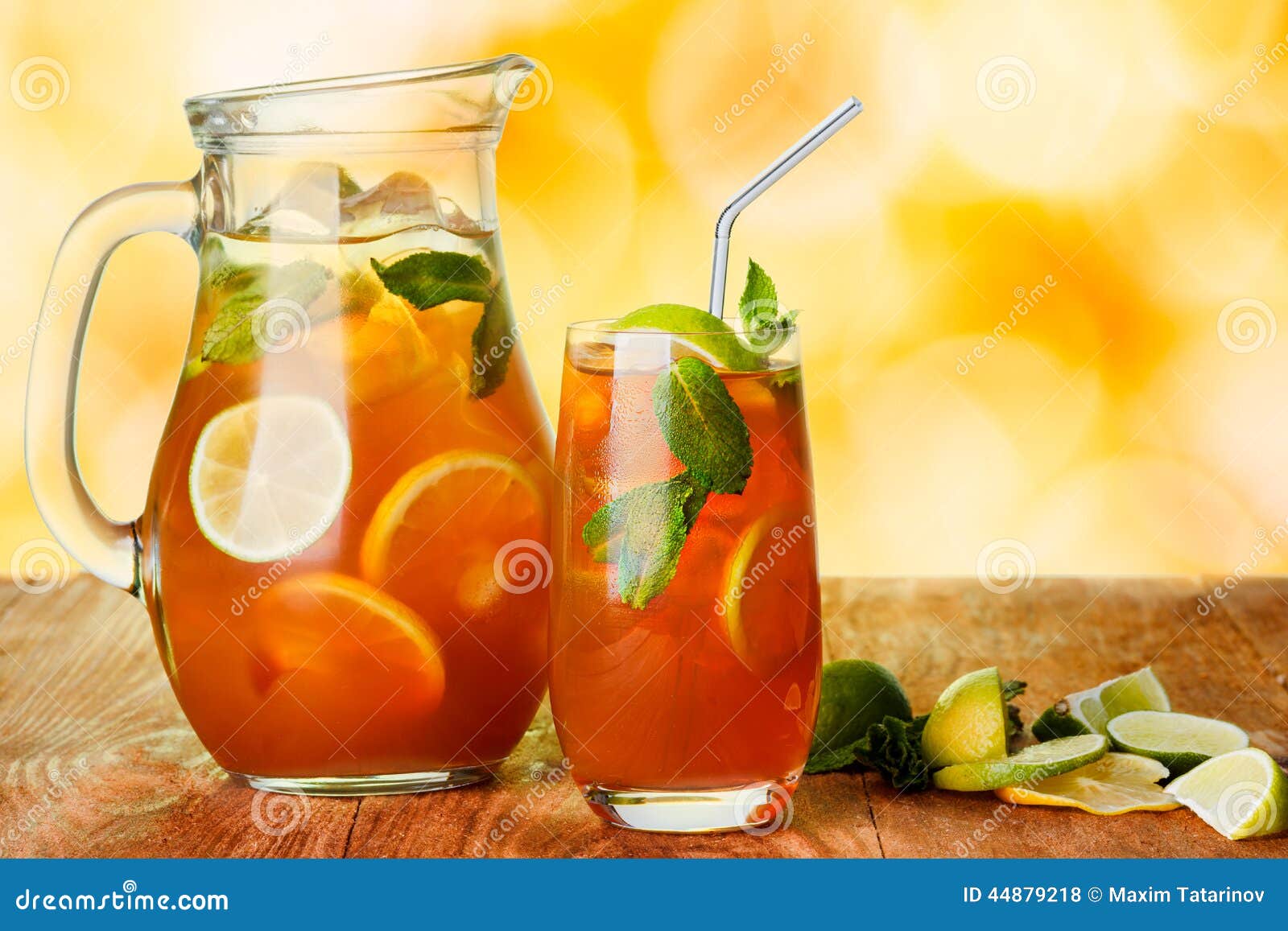 https://thumbs.dreamstime.com/z/iced-tea-pitcher-glass-jug-cold-drink-lemon-mint-wooden-table-over-abstract-background-44879218.jpg