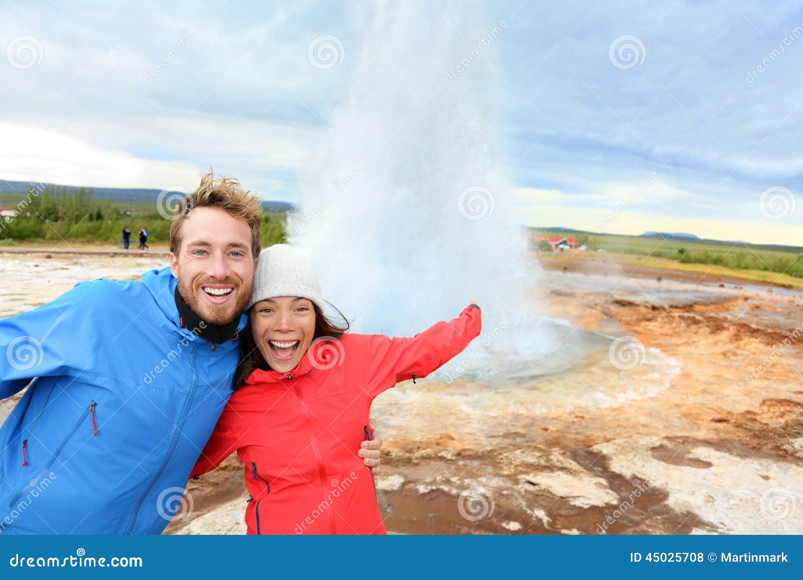 Iceland Tourists Fun By Strokkur Geyser Stock Photo - Image of