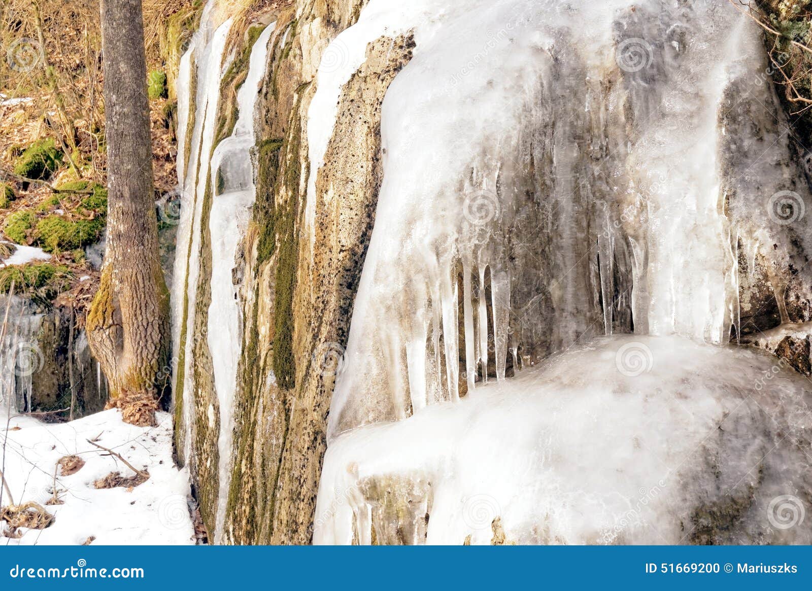 icicles and ice on the rocks