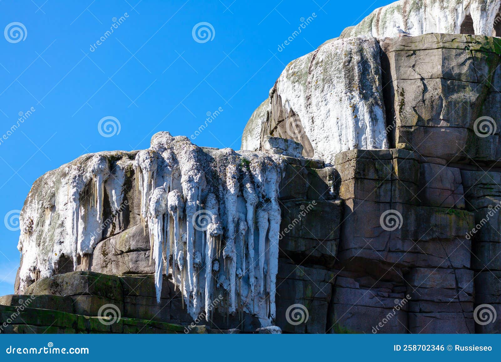 icicles on top of a mountain