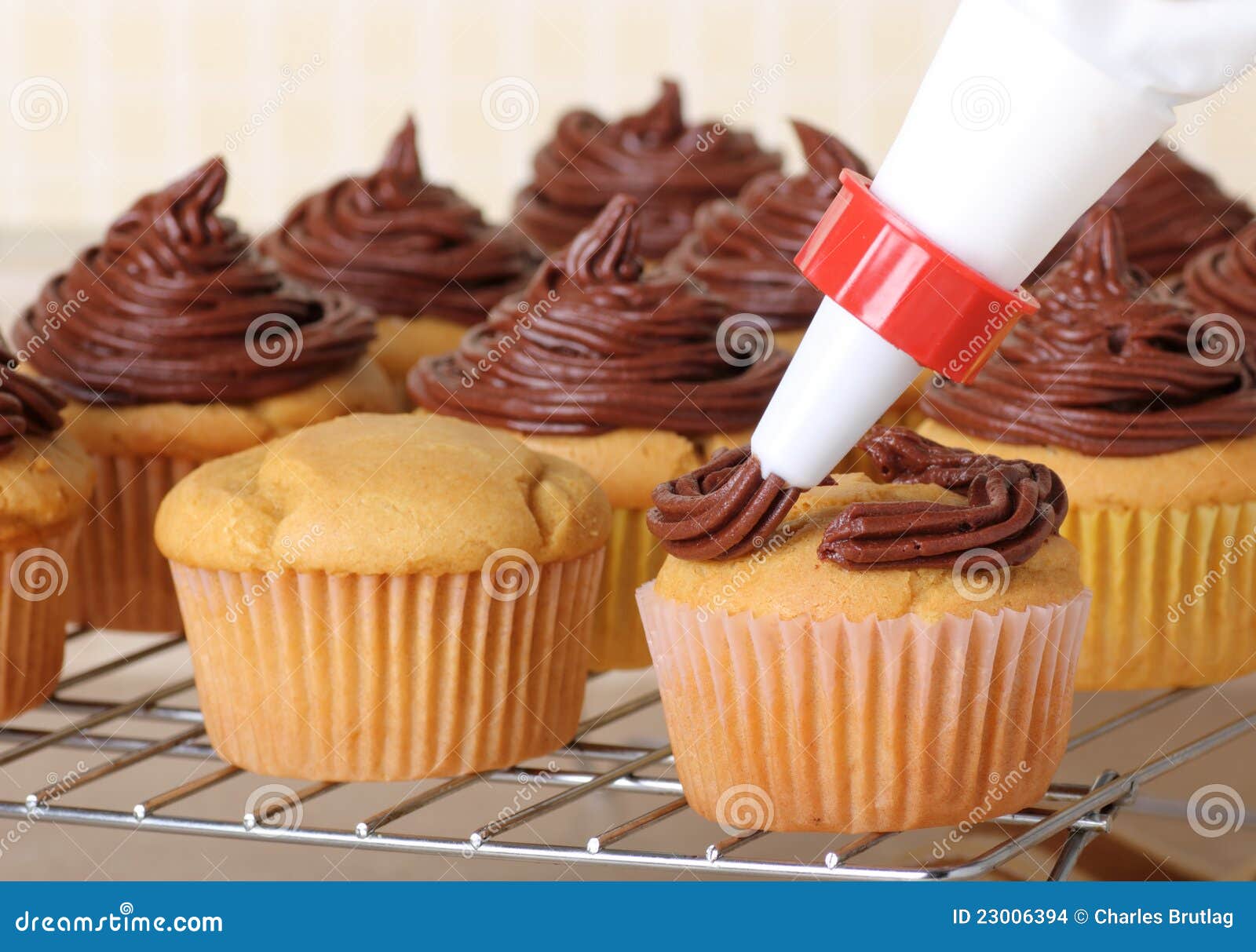 Icing Cup Cakes stock photo. Image of food, rack, dessert 23006394