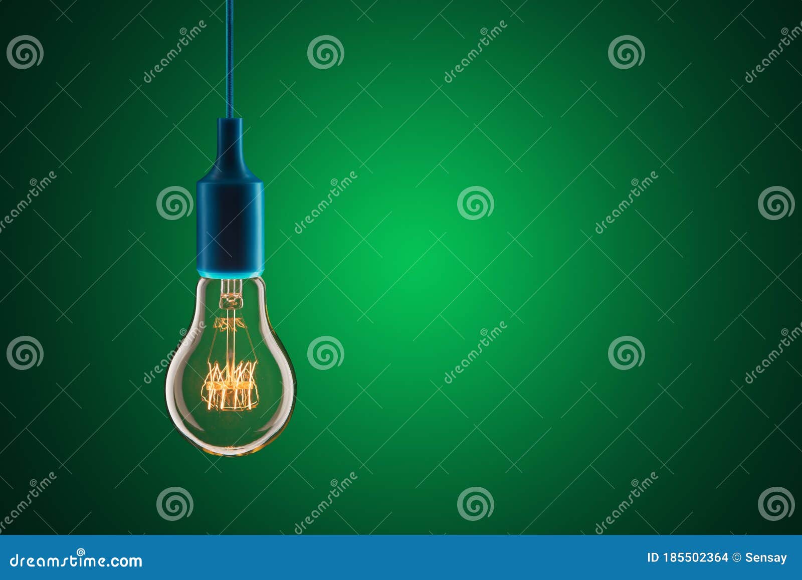 Idea and Leadership Concept - Bulbs on the Green Background Stock Photo