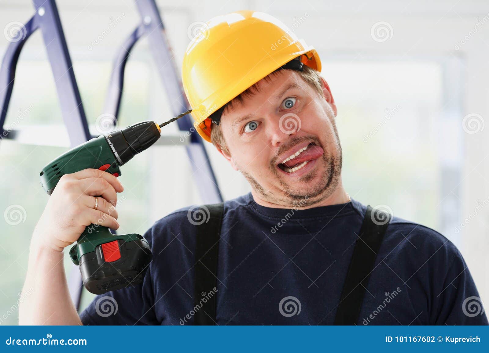 idiot worker using electric drill portrait