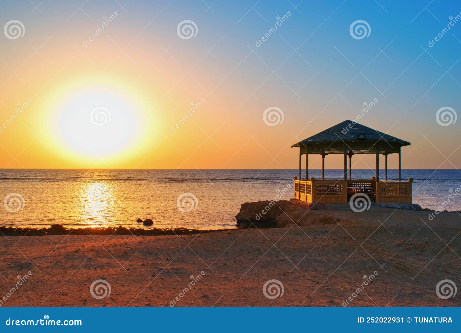 idylic beach with gazebo within sunrise,  marsa alam , red sea, egypt