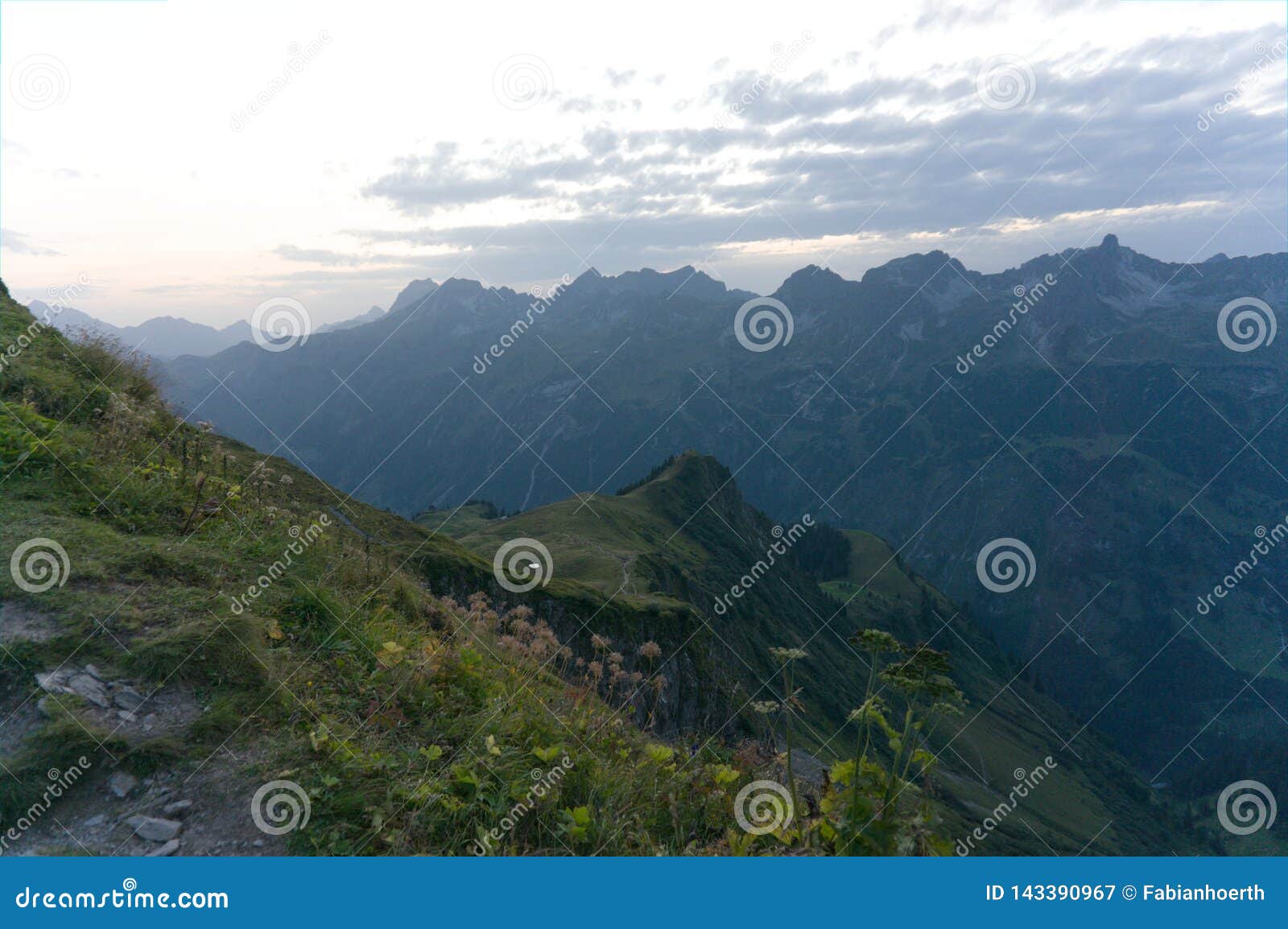 Idyllic Mountain Scenery In The Alps In Springtime With Fresh Green