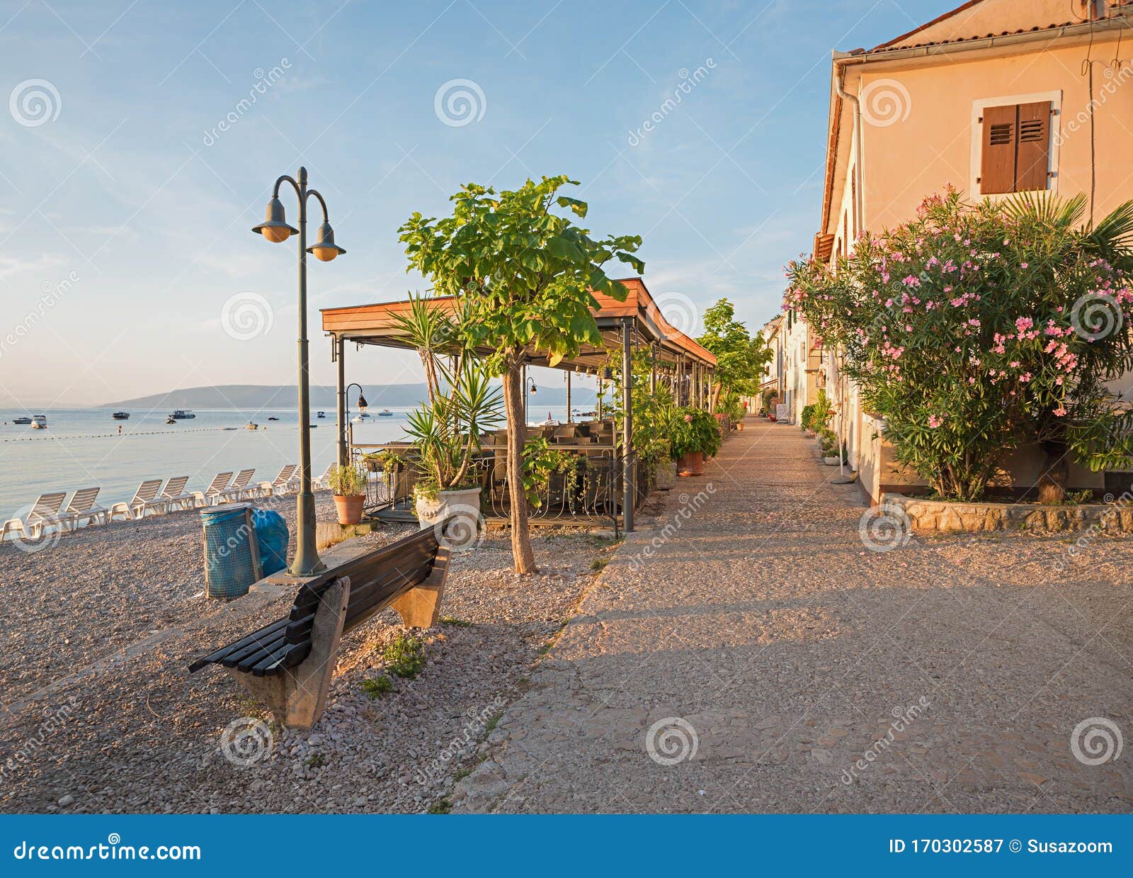 idyllic seaside promenade, morning mood at moscenicka draga village, croatia