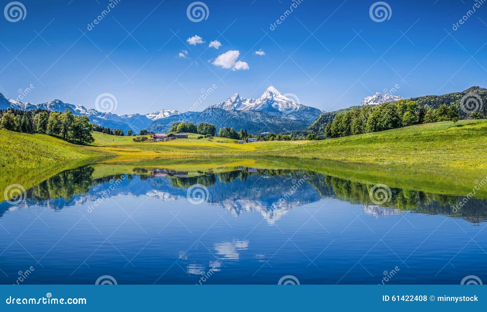 idyllic summer landscape with clear mountain lake in the alps