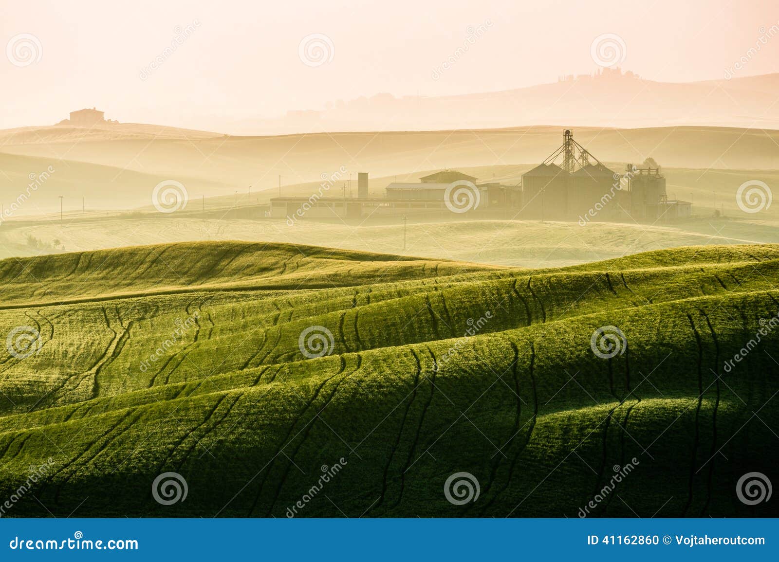 idyllic view of hilly farmland in tuscany