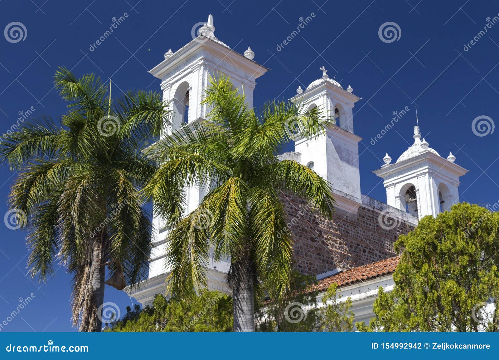 iglesia santa lucia catholic church white tower palm trees suchitoto el salvador